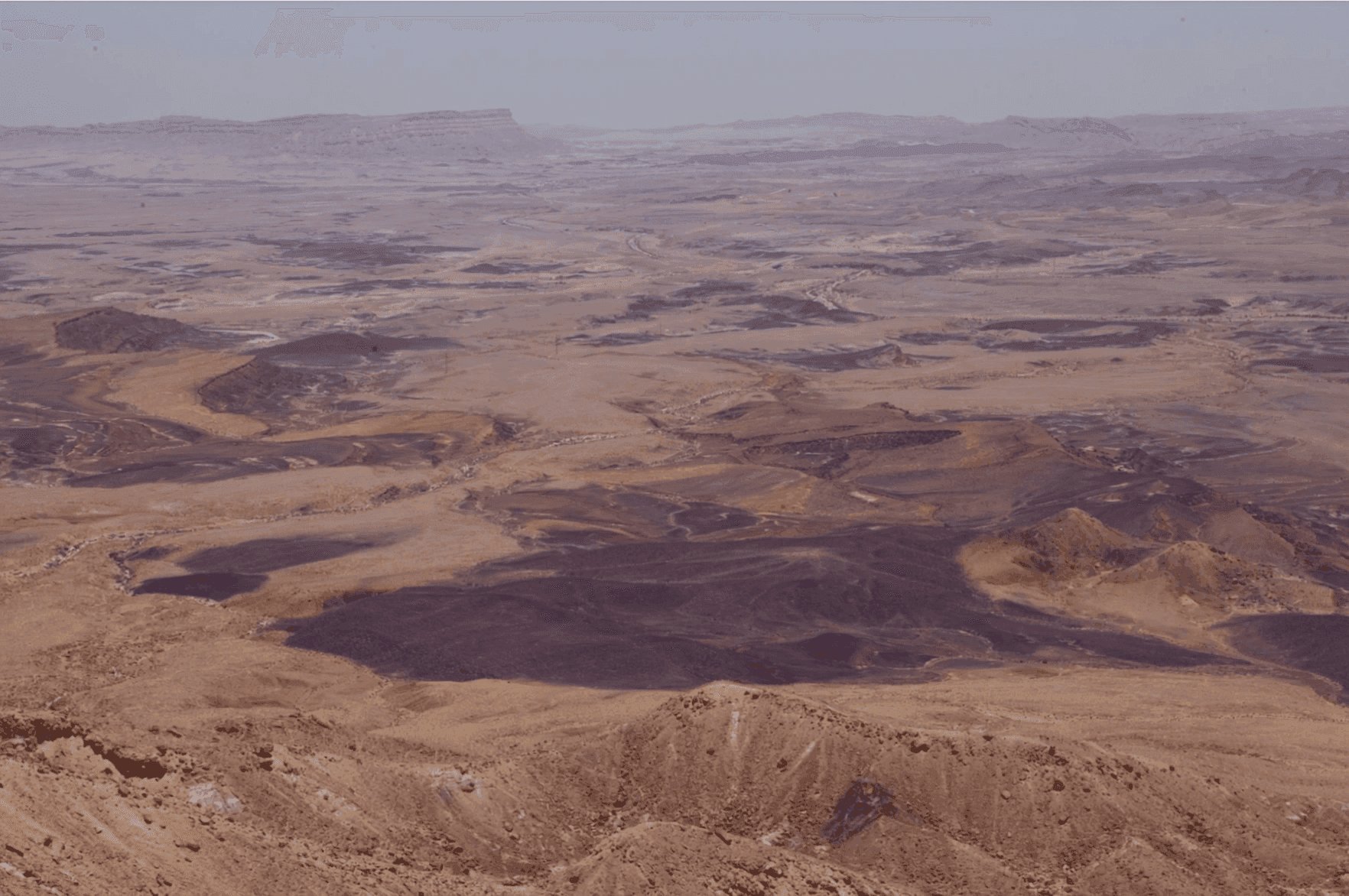 Desert landscape with dramatic geological formations